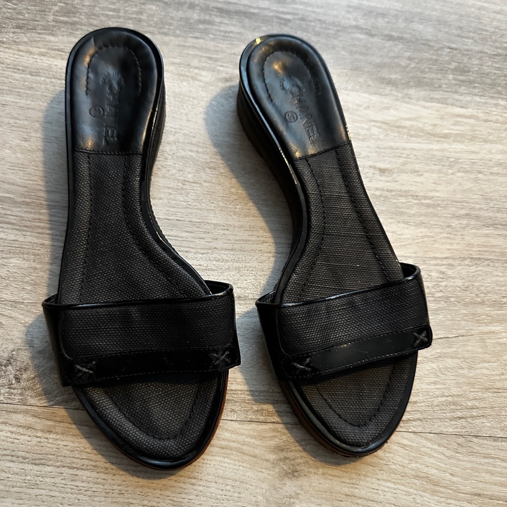 Chanel black canvas leather sandals mules slides slip on in flats